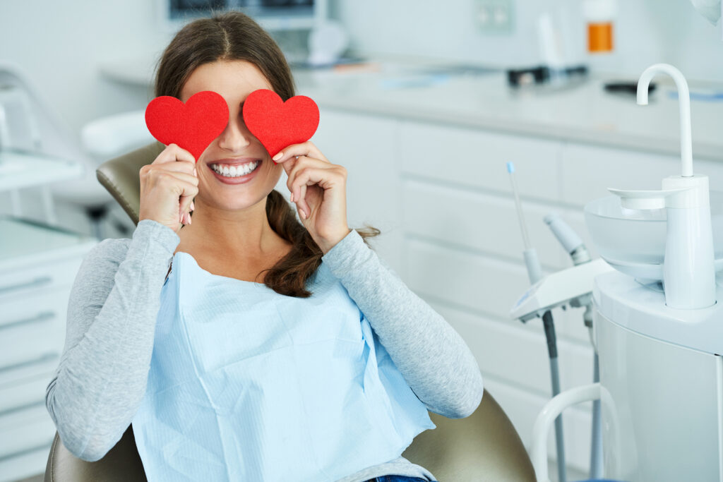 attractive adult woman dentist office with hearts attractive adult woman dentist office with hearts
