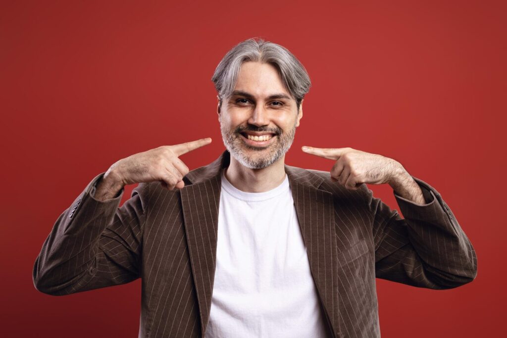 man pointing his smile 1099310 287 man pointing his smile 1099310 287