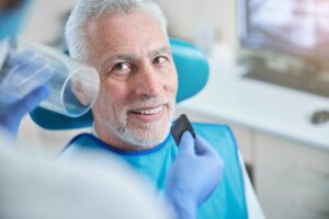 optimistic elderly citizen sitting down while being prepared dental x ray 317809 3087 optimistic elderly citizen sitting down while being prepared dental x ray 317809 3087